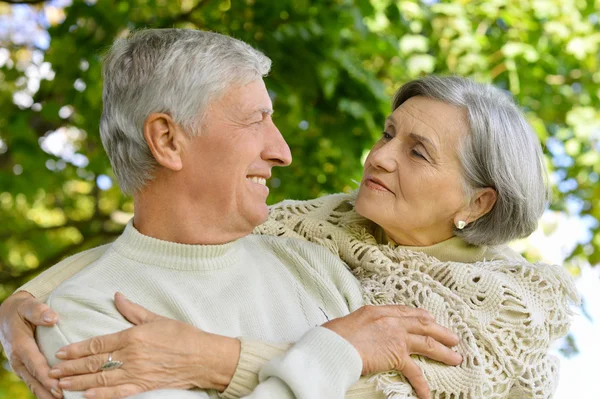 Senior couple in autumn park — Stock Photo, Image