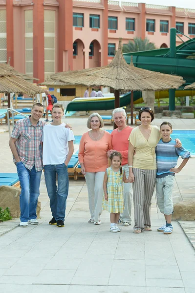 Family relaxing at vacation resort — Stock Photo, Image