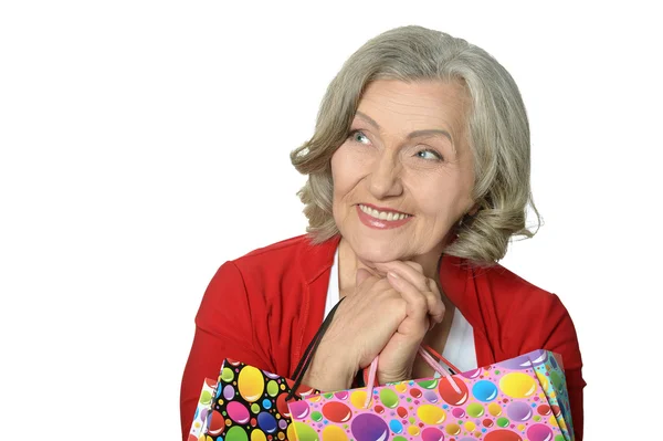 Senior woman with shopping bags — Stock Photo, Image