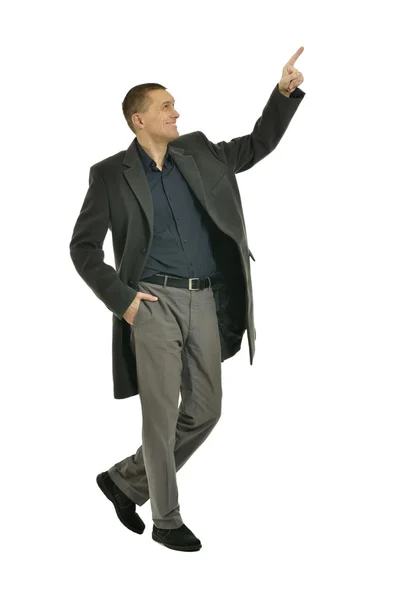 Homem de casaco apontando para cima — Fotografia de Stock