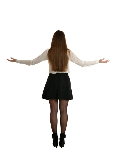 Kvinnan i svart kjol stående — Stockfoto