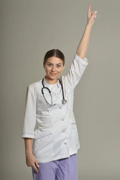 Kobieta lekarz skierowana w górę — Zdjęcie stockowe