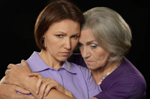 Sad Senior woman with daughter — Stock Photo, Image