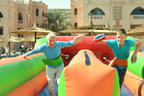 Grandfather and grandson  in park — Stock Photo, Image