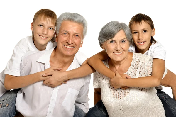 Счастливые бабушки и дедушки и внуки — стоковое фото