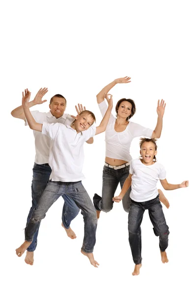 Familie springt auf weißem Hintergrund — Stockfoto