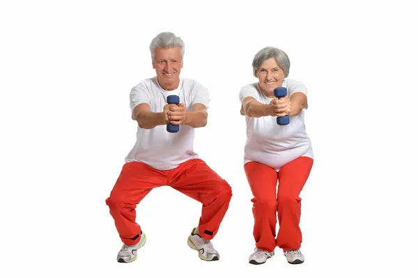 Elderly couple in a gym — Stock Photo, Image