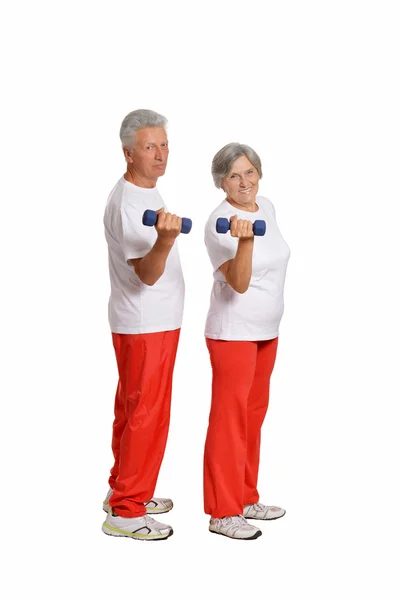 Elderly couple in a gym — Stock Photo, Image