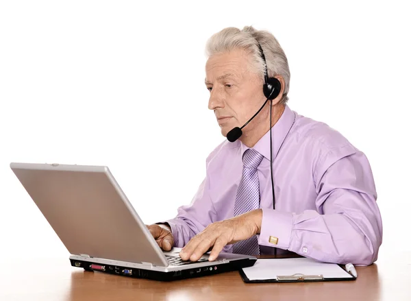 Zakenman met laptop op witte — Stockfoto