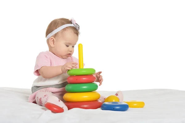 Glückliches Baby spielt mit Spielzeug — Stockfoto