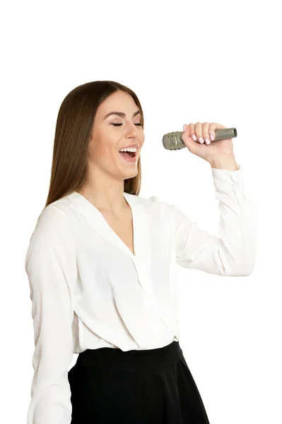 Fiatal nő, mikrofon — Stock Fotó