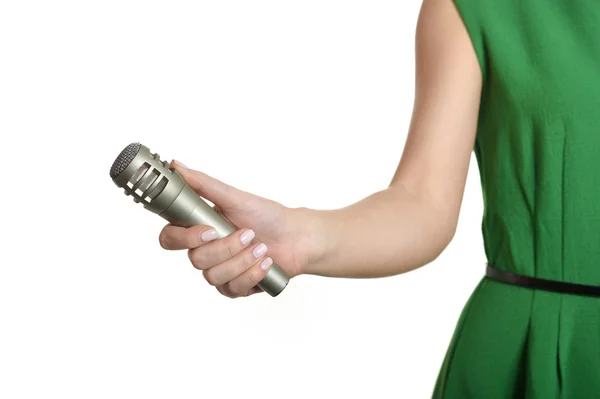 Female hand with microphone — Stock Photo, Image