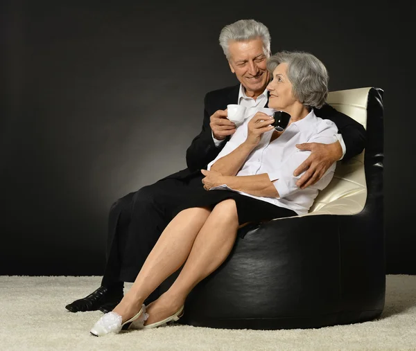 Couple with cap of coffee — Stock Photo, Image