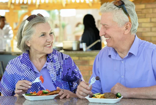 Senior couple having breakfast — Stock Photo, Image