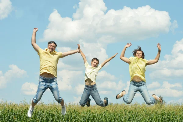 Famiglia che salta fuori — Foto Stock