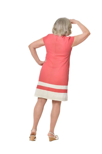 Senior woman in bright dress — Stock Photo, Image