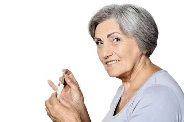 Senior sick woman with thermometer — Stock Photo, Image