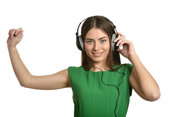 Menina ouvindo música em fones de ouvido — Fotografia de Stock