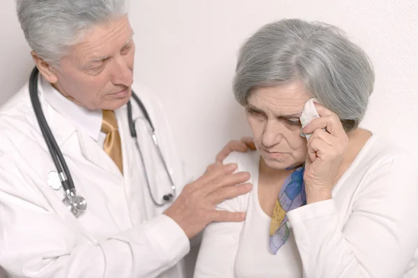 Doctors discussing at table — Stock Photo, Image