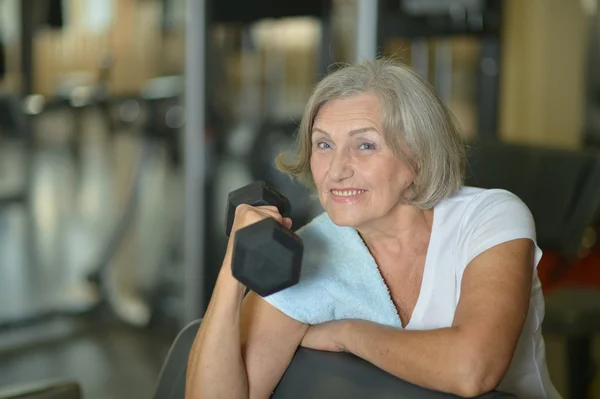 Woman with dumbbell — Stock Photo, Image