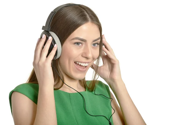 Chica escuchando música en auriculares —  Fotos de Stock