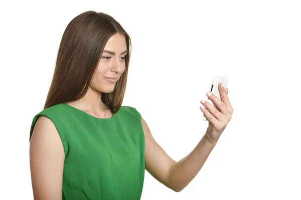 Menina bonita com telefone móvel — Fotografia de Stock