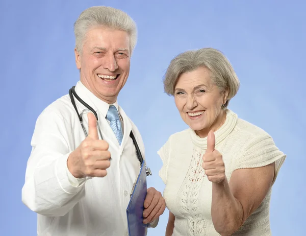 Senior woman visiting doctor — Stock Photo, Image