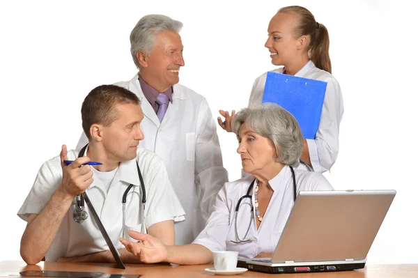 Group of doctors with laptop — Stock Photo, Image