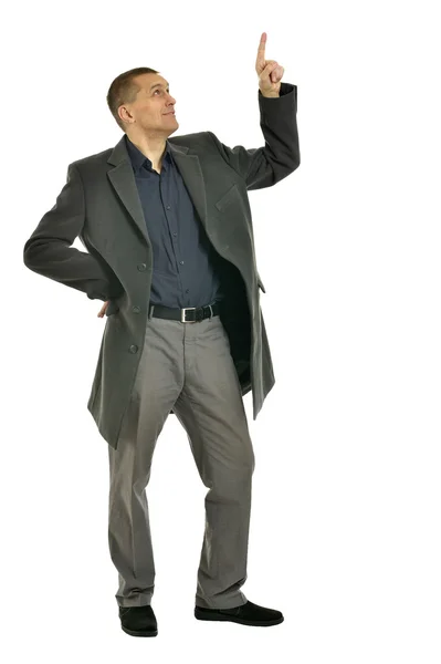 Handsome Man in coat pointing — Stock Photo, Image