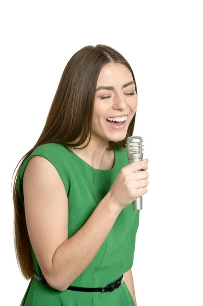 Молодая женщина с микрофоном — стоковое фото