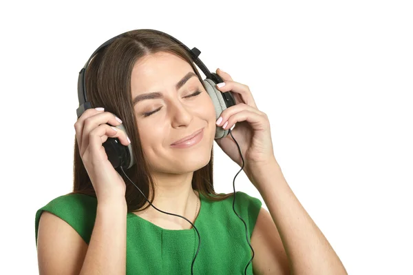 Chica escuchando música en auriculares — Foto de Stock