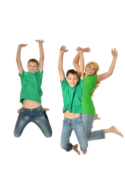 Happy Mother and sons jumping — Stock Photo, Image