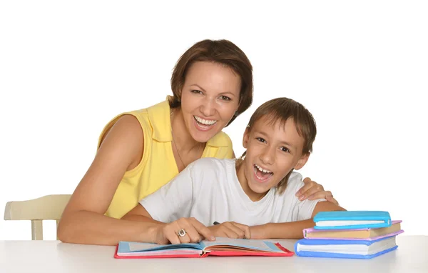 Mãe e filho fazendo lição de casa — Fotografia de Stock
