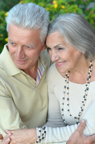 Mature couple in summer park — Stock Photo, Image