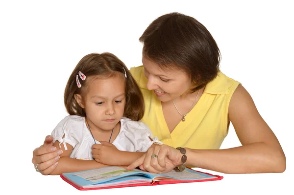 Mother doing homework with  daughter — Stock Photo, Image