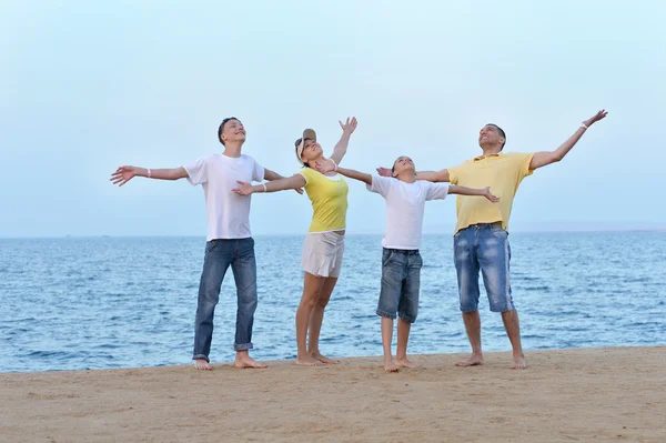 Happy family  at beach — Stock Photo, Image