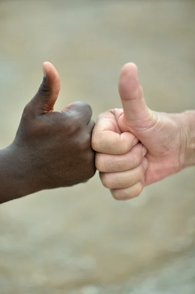 多民族の手の親指 — ストック写真