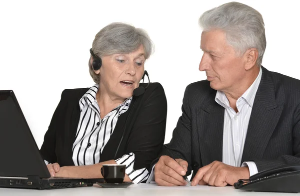 Mature couple in  workplace — Stock Photo, Image