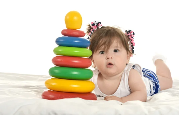 Baby girl playing with toys — Stock Photo, Image