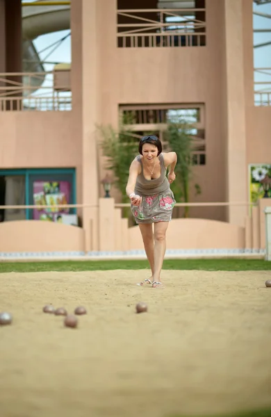 Beautiful  woman playing Boules game — 스톡 사진