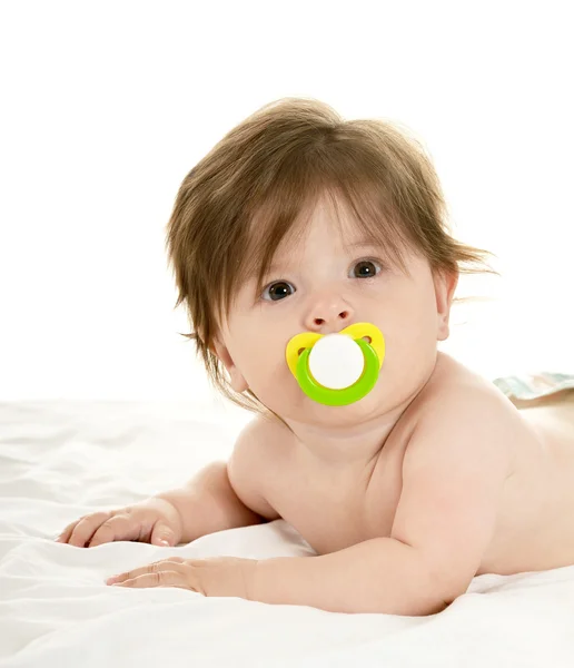 Schattig babymeisje met fopspeen — Stockfoto