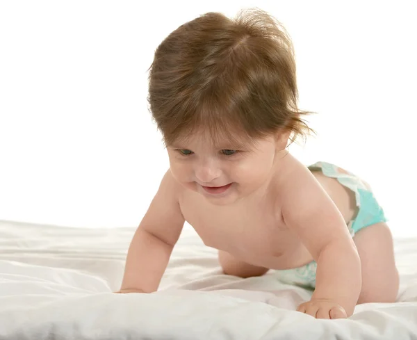 Baby girl lying in pampers — Stockfoto