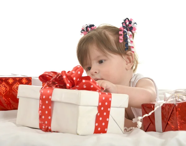 Cute baby girl  with gifts — Stok fotoğraf