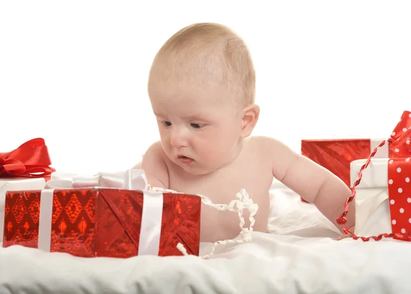 Cute baby girl   with gifts — Stok fotoğraf