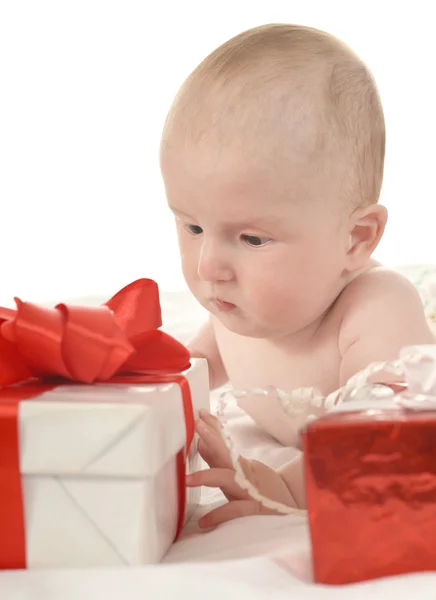Cute baby girl   with gifts — 스톡 사진