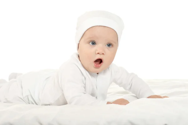 Baby girl  in hat on blanke — Zdjęcie stockowe