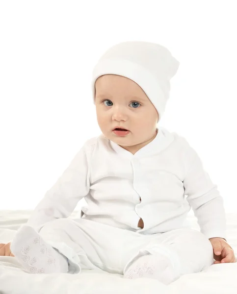 Baby girl  in hat on blanke — Stok fotoğraf