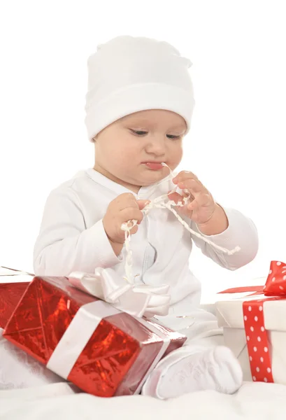 Cute baby girl   with gifts — Stok fotoğraf