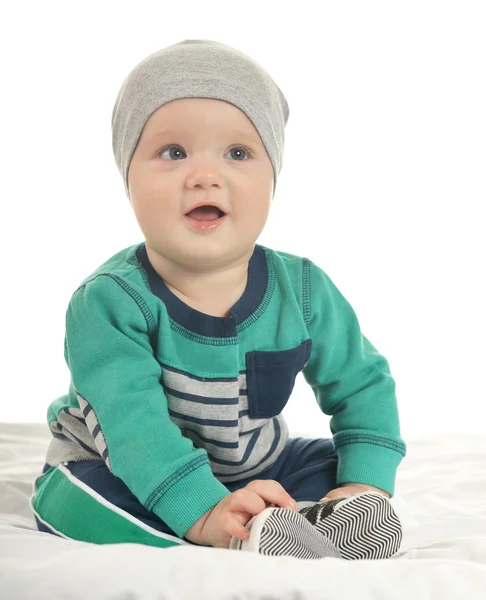 Beautiful  baby in hat  on blanket — Stockfoto