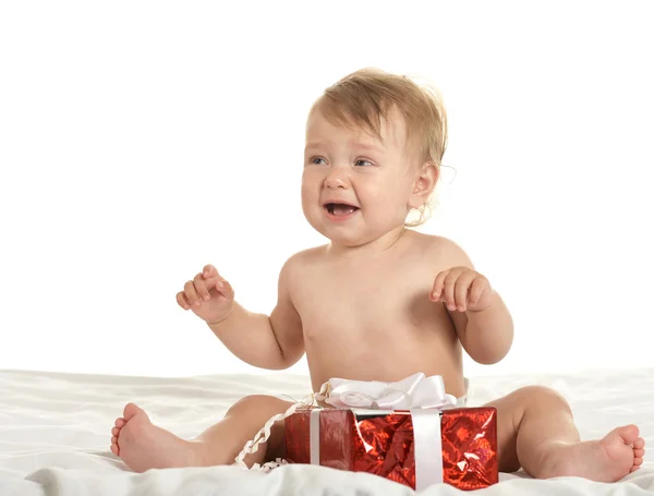 Cute baby girl with gift — Stok fotoğraf